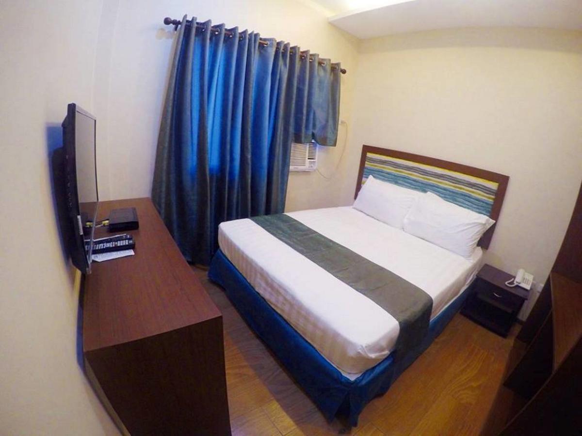 Golden Gate Suites Dumaguete City Esterno foto